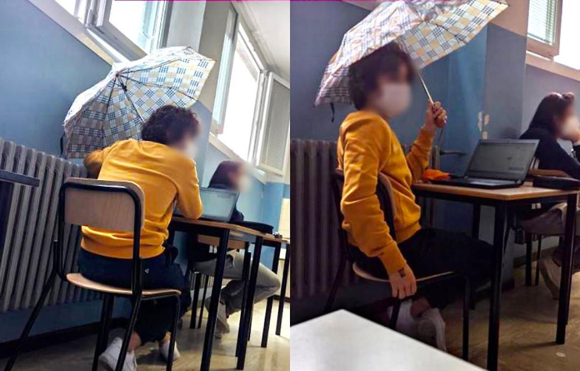 Ombrello aperto in classe, studenti fanno lezione al gelo. Finestre aperte per evitare contagi Covid