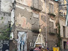 Processione del "Santo" nelle ferite della città