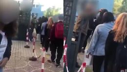 “Bidello scanner" misura la febbre con una mano sulla fronte