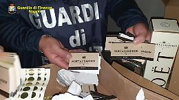 Sequestrati 1.400 litri tra champagne e olio contraffatti