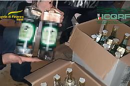 Prodotti alcolici contraffatti, 12 arresti